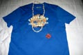 2009.01.26 21:43  らんらん "昨年ホノルルマラソンで無事ゴールできた証の<br />完走Ｔシャツとメダルです。"